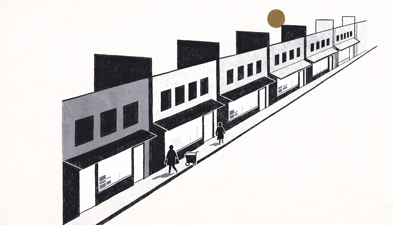 Flat-vector editorial illustration of a row of convenience-store storefronts along a Japanese street at dusk, warm lantern-lit windows, a delivery handcart stacked with crates, and anonymous silhouette shoppers entering and exiting, one small brass-gold accent.