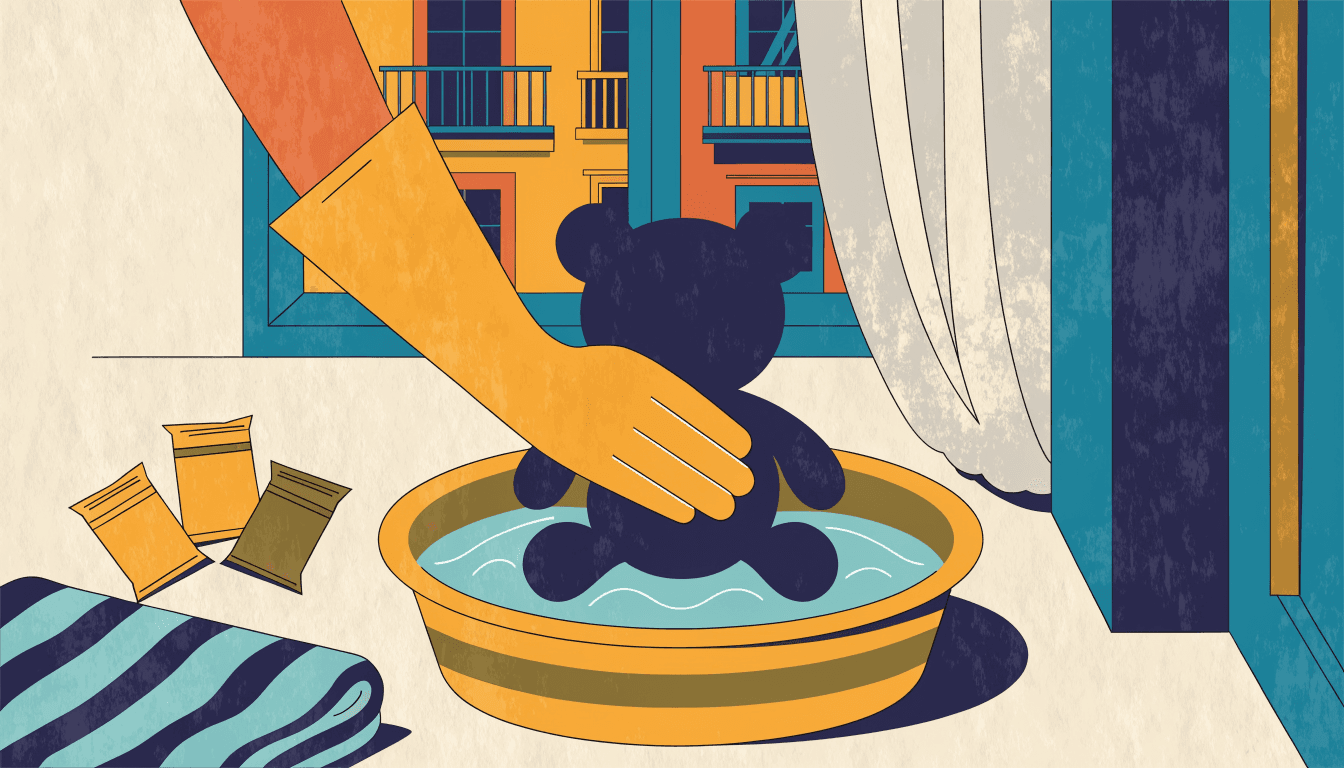 Flat editorial illustration of a gloved hand washing a plush bear in a basin beside three sachet packets and a folded towel, warm cream, teal and ochre palette.