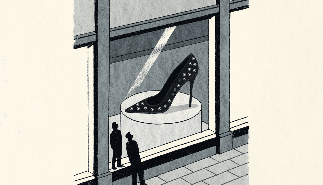 Illustration of a boutique window display showing a single studded stiletto pump on a pedestal, viewed through a storefront window with two silhouetted figures looking in.